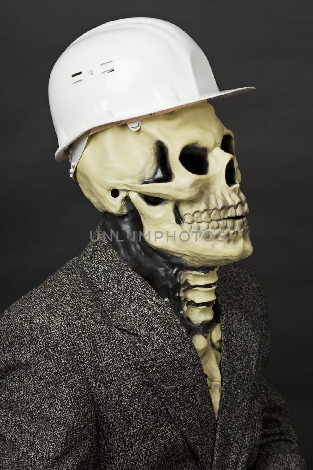 The deadly construction superintendent in a white protective helmet