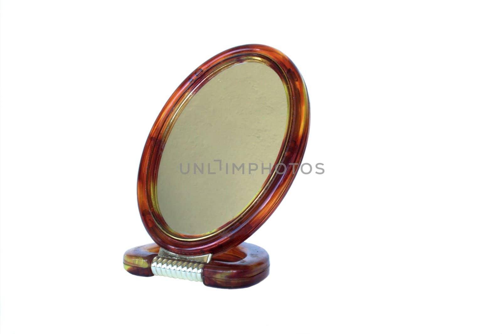 Oval table mirror in isolated over white