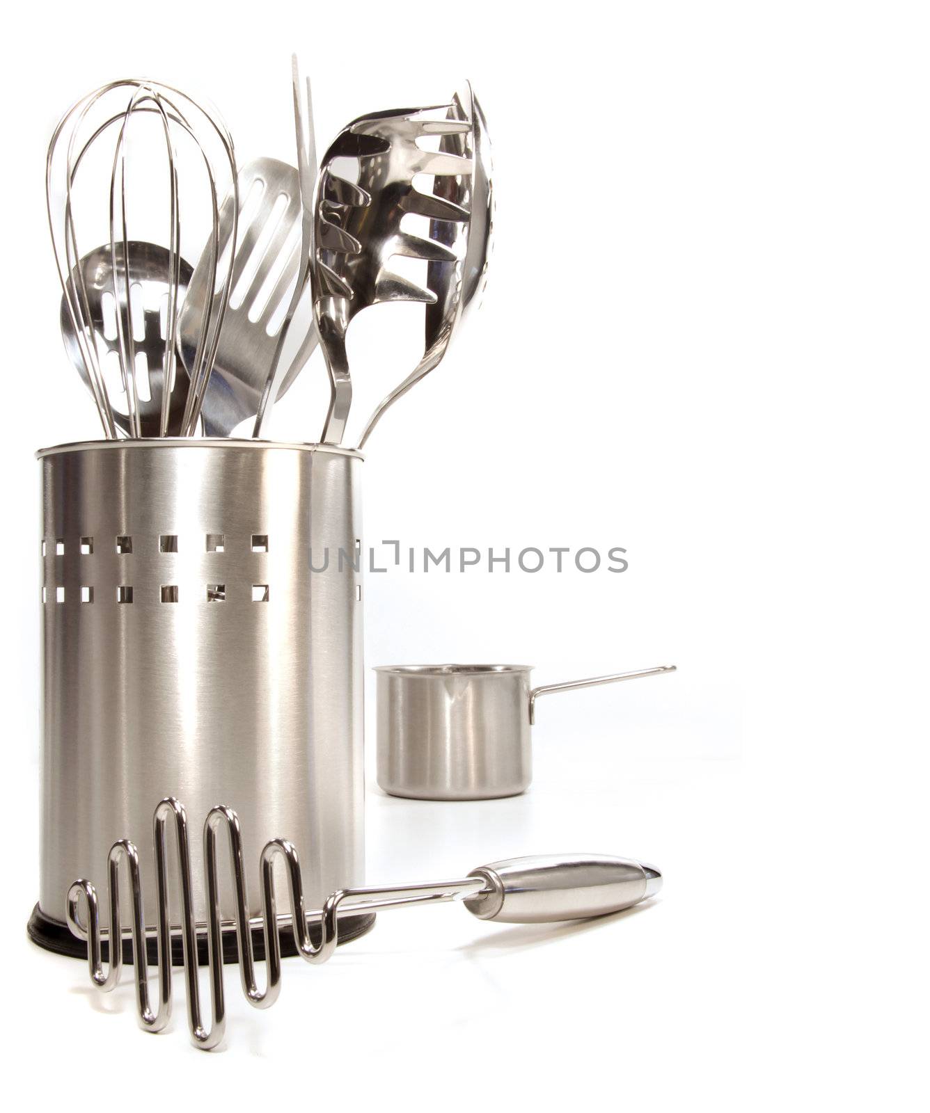 Variety of stainless utensils on white background