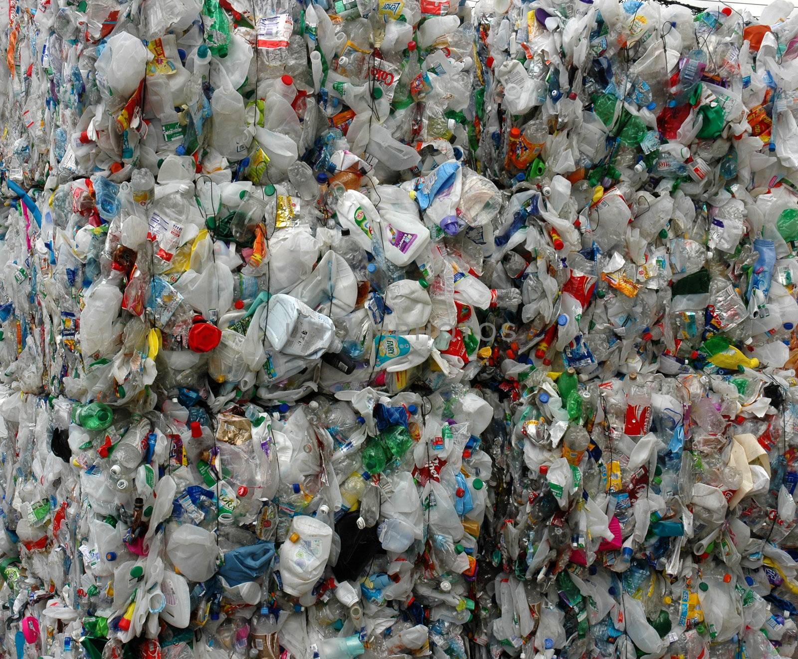 Stack of plastic waiting to be recycled at recycling plant