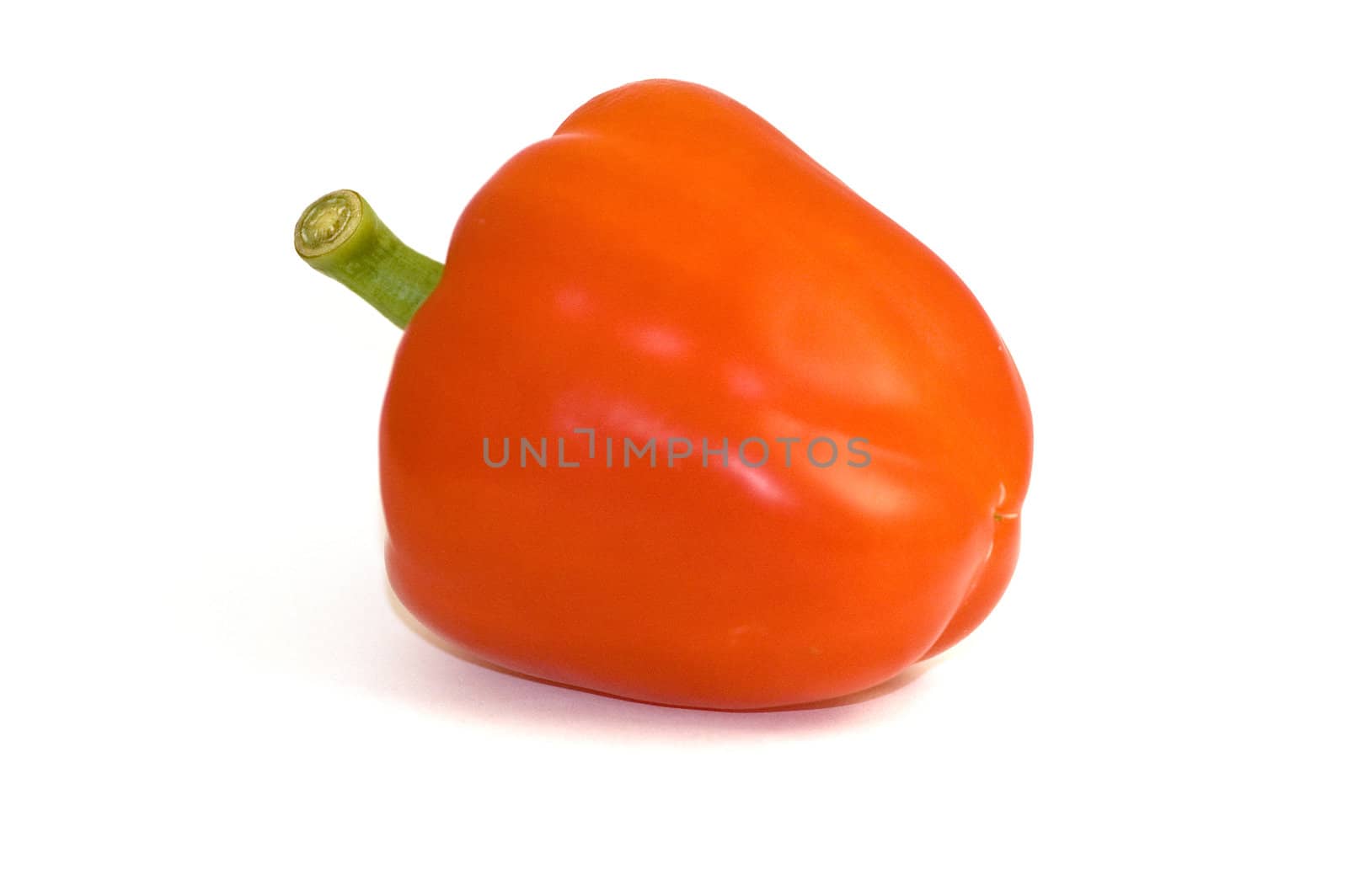 A red pepper on a white background