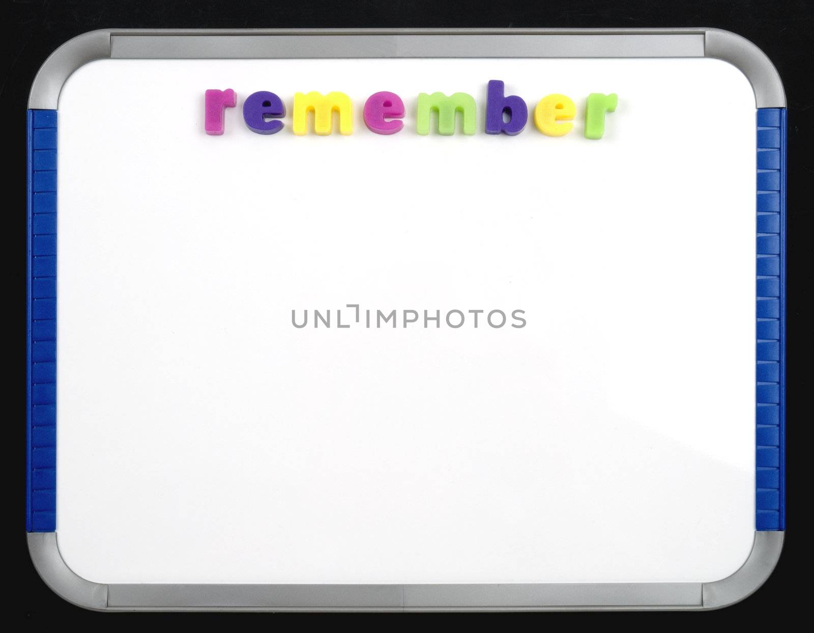 A magnetic letter board with the word Remember