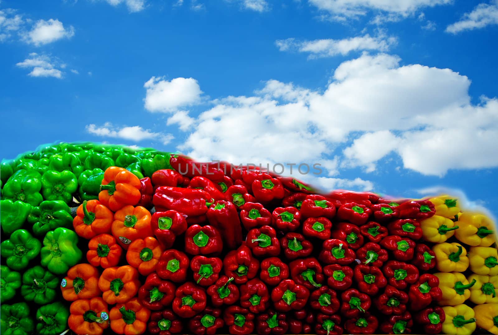 Bell Peppers against blue sky by GunterNezhoda