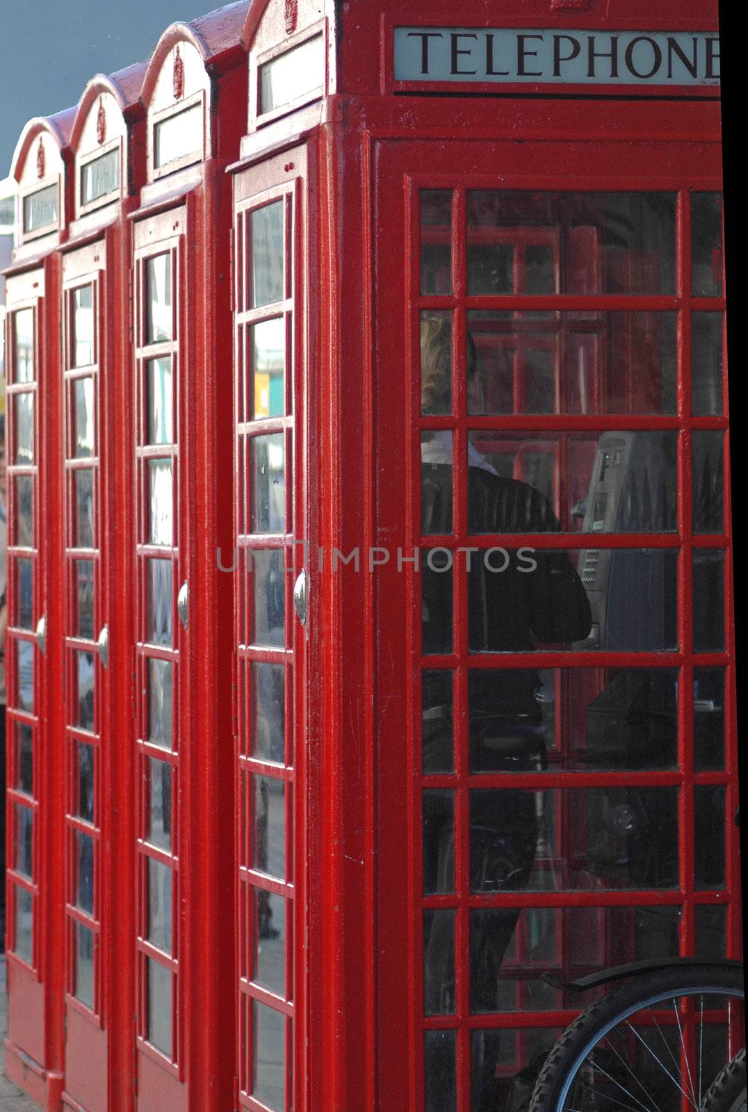 A row of iconic British Telephone Boxes