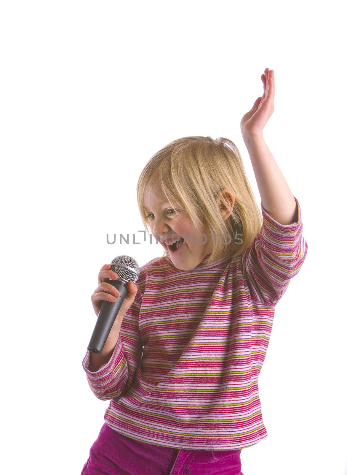 A child wannabe pop idol with microphone