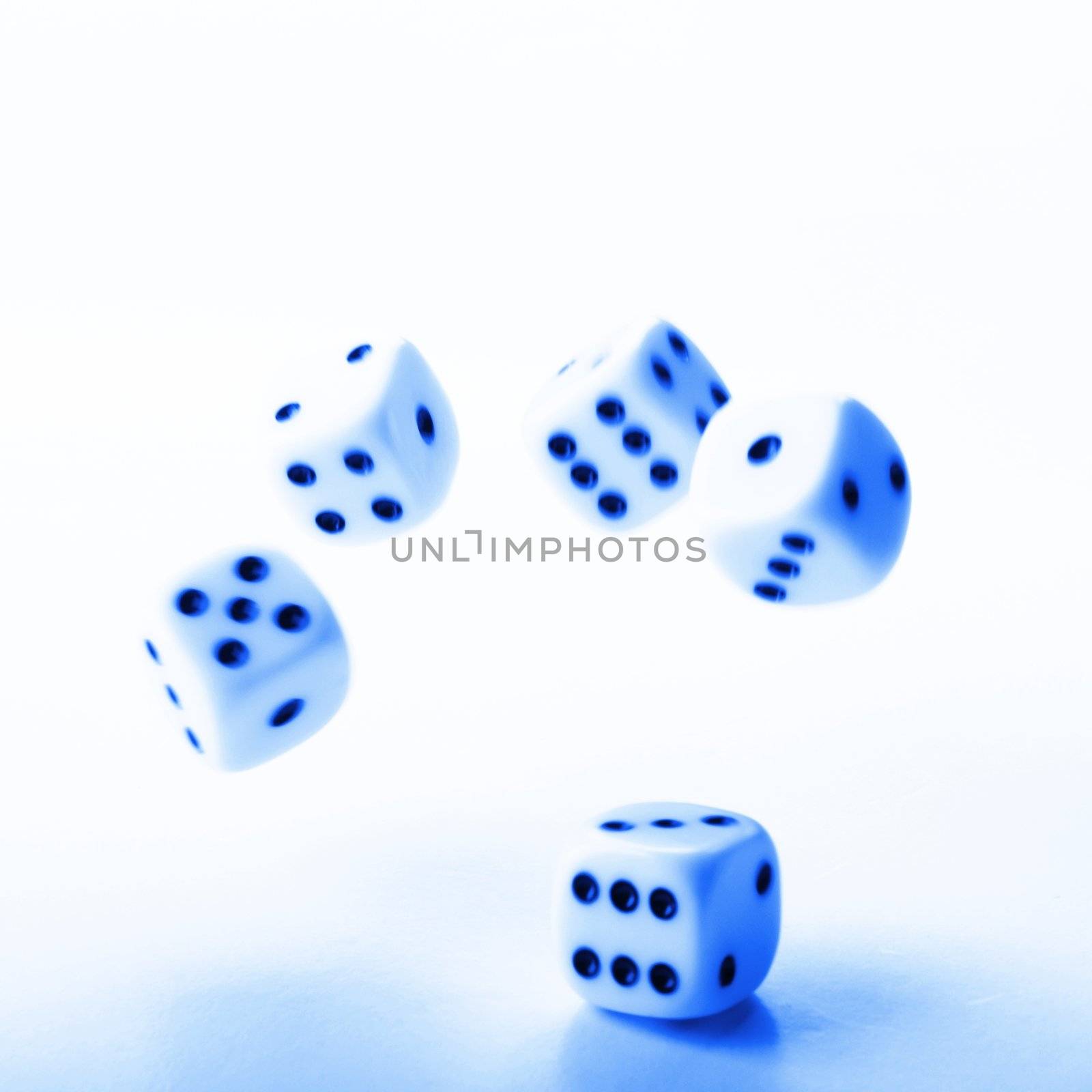 falling dice showing random fortune or casino concept