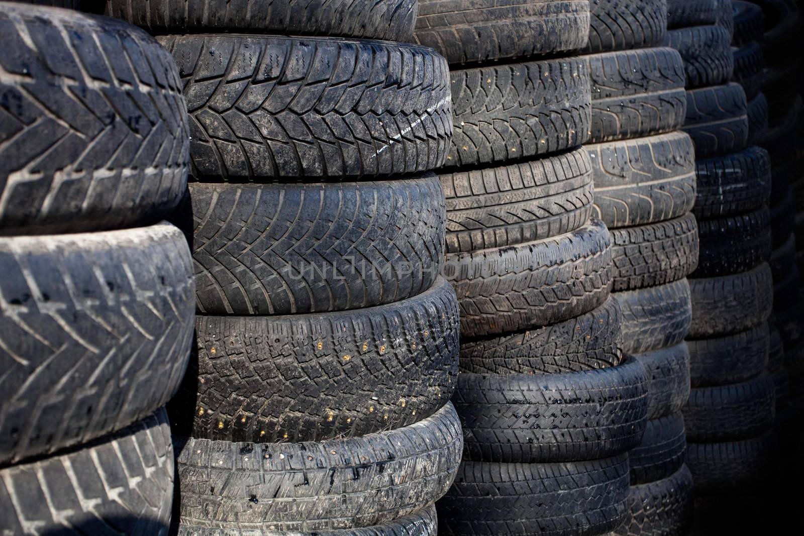 Large pile of used old car tires