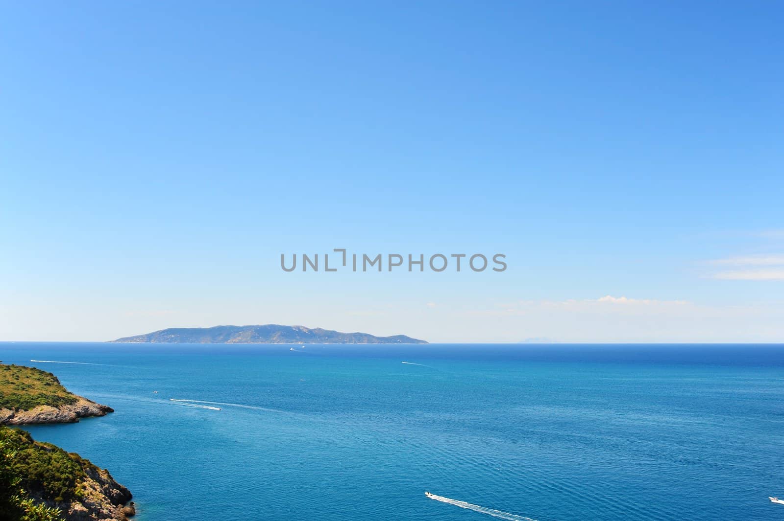 A Typical Italian Seascape With Hills And Indented Coastline