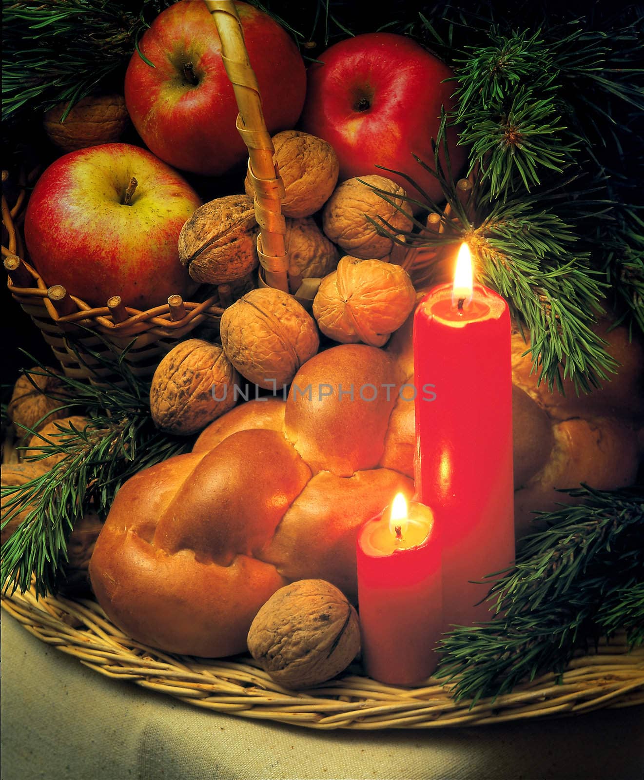 christmas stil life with a candles,nuts and apples