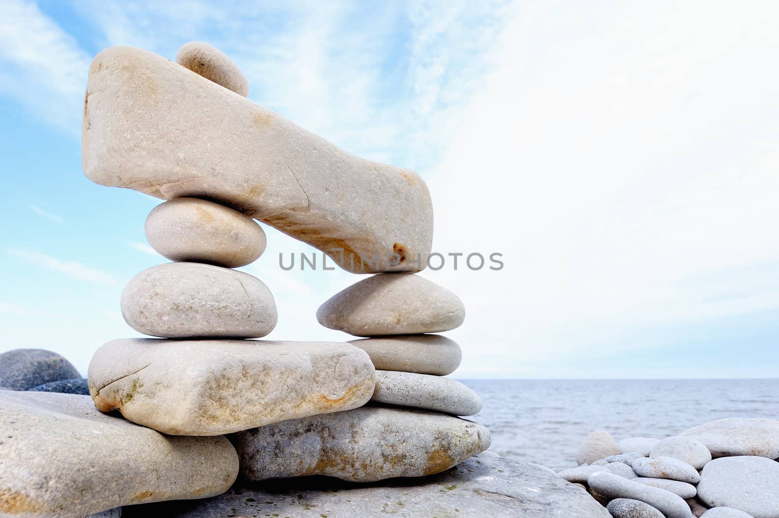 Some small pebbles are connected with a large stone