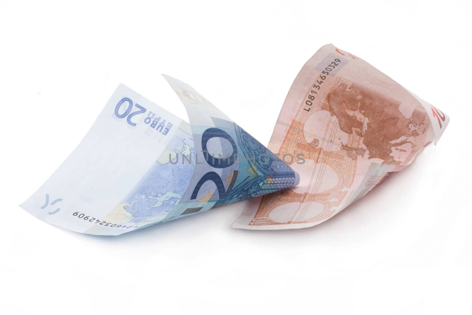 Bills euro rolled up insulated on white background