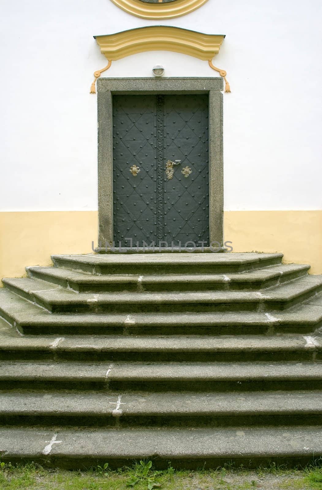 symetric staircase leading to church door