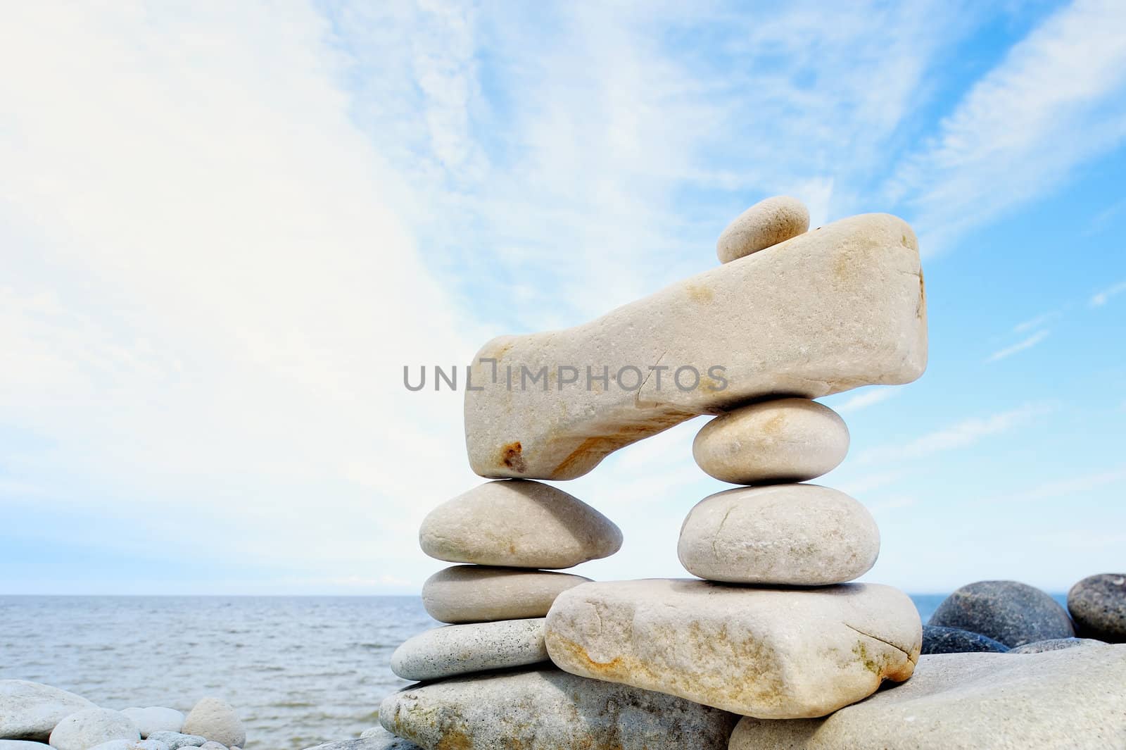 Some small pebbles are connected with a large stone