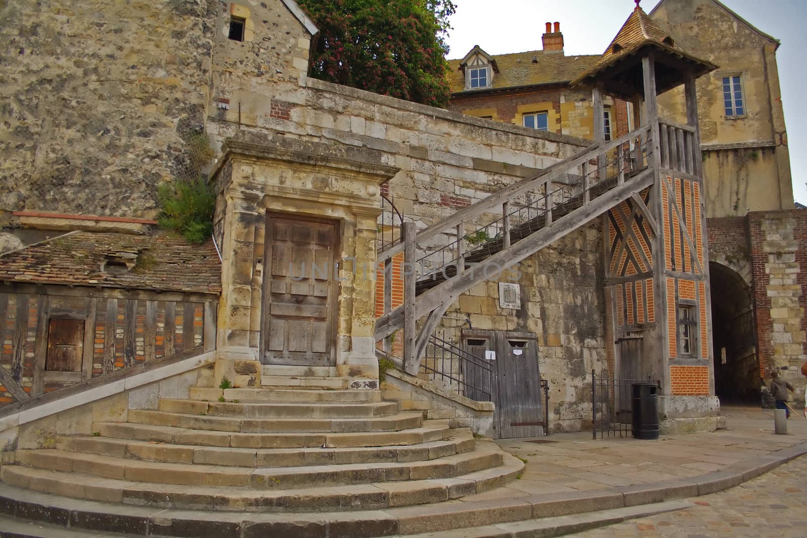 Building with circular stair in Honfleur's old city in Normandy, France