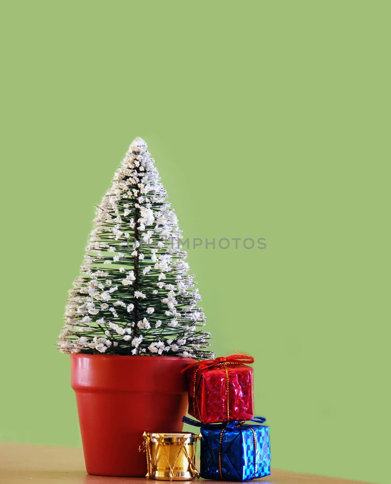 small christmas gifts in arms isolated on white