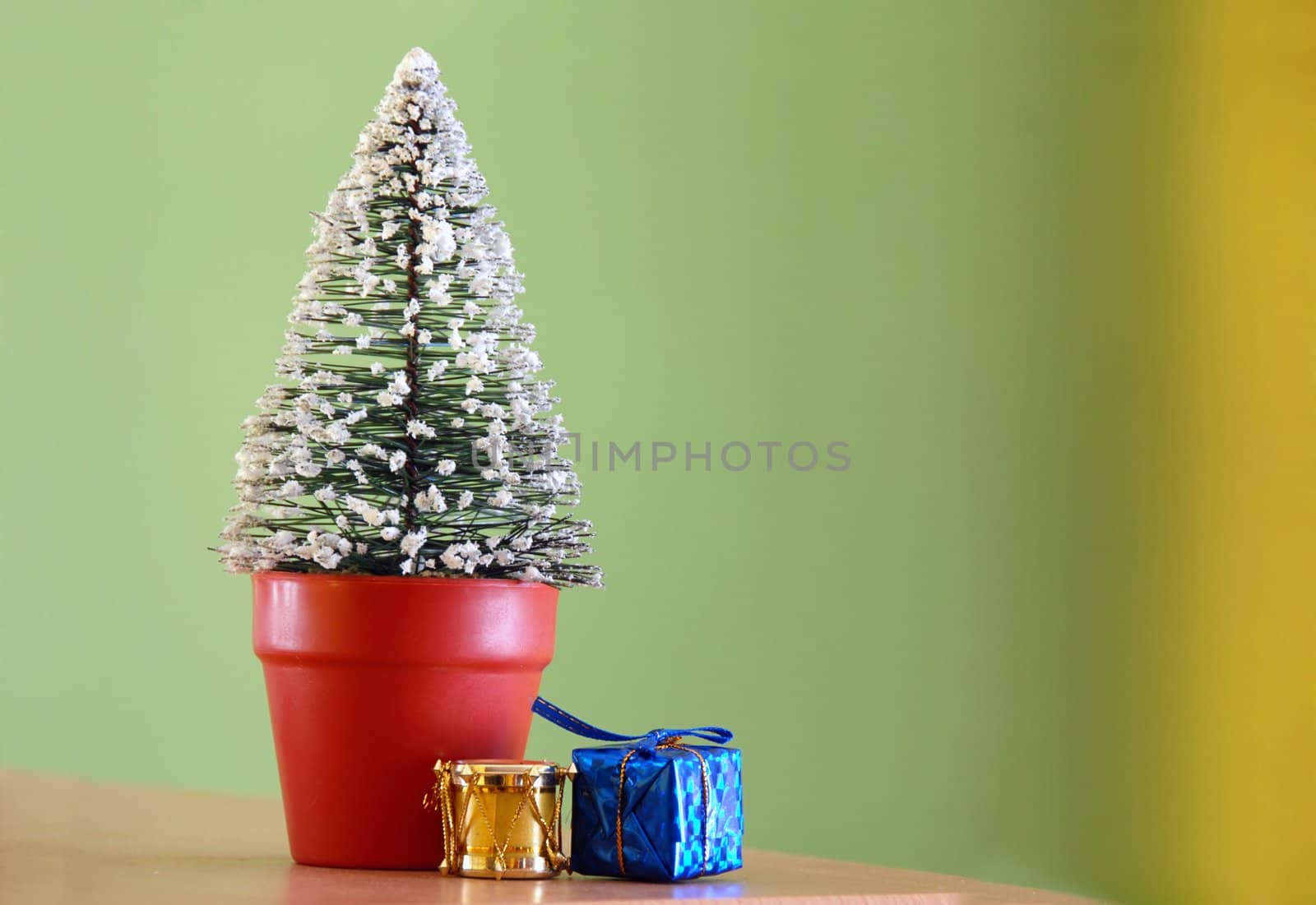 small christmas gifts in arms isolated on white