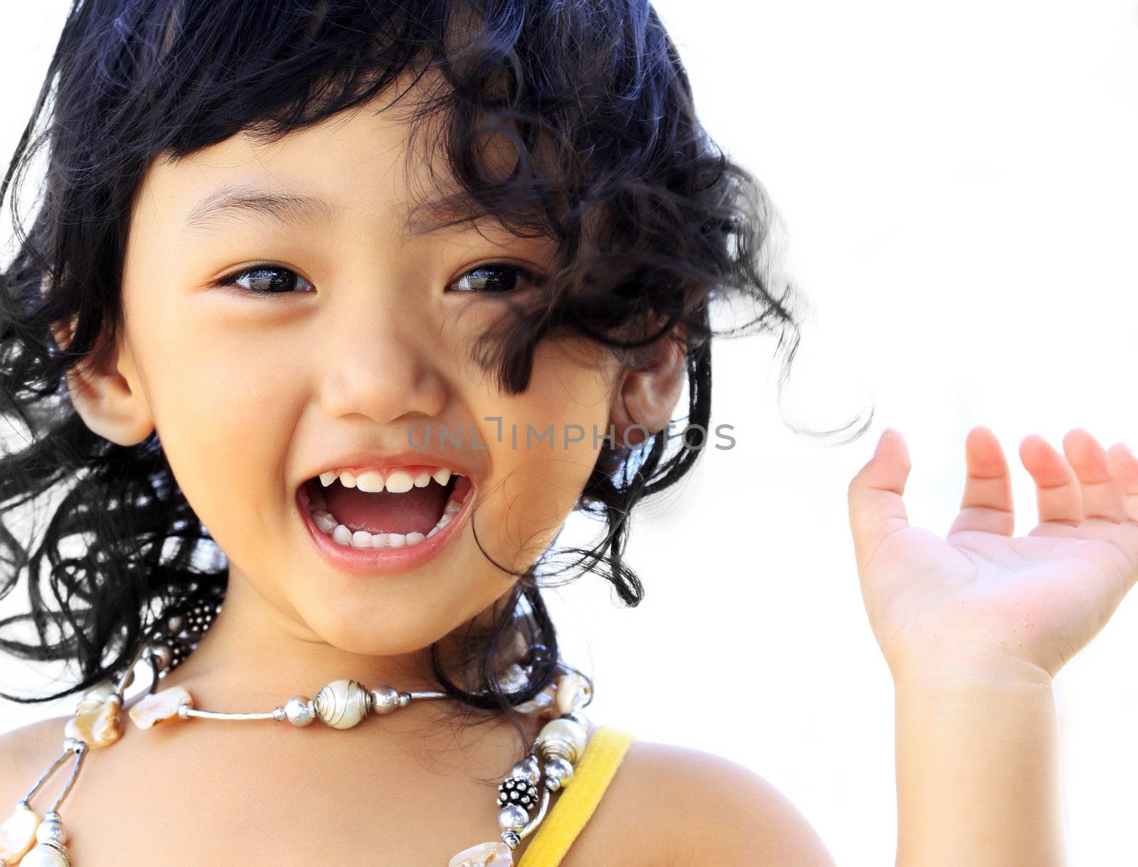 Portrait of the beautiful small Asian girl. Indonesia. Java