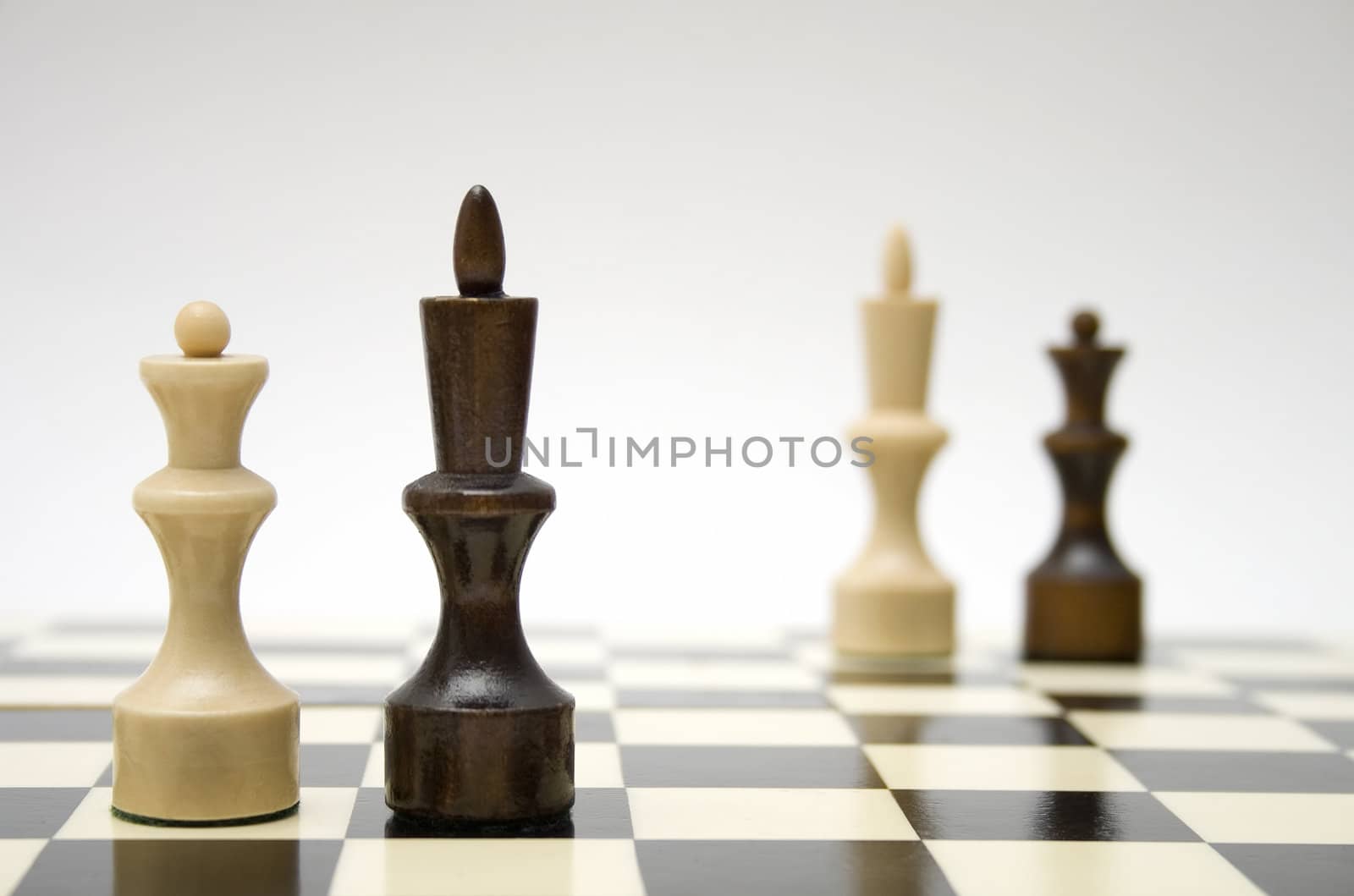 Chess queen and king - interracial marriage concept by Nickondr