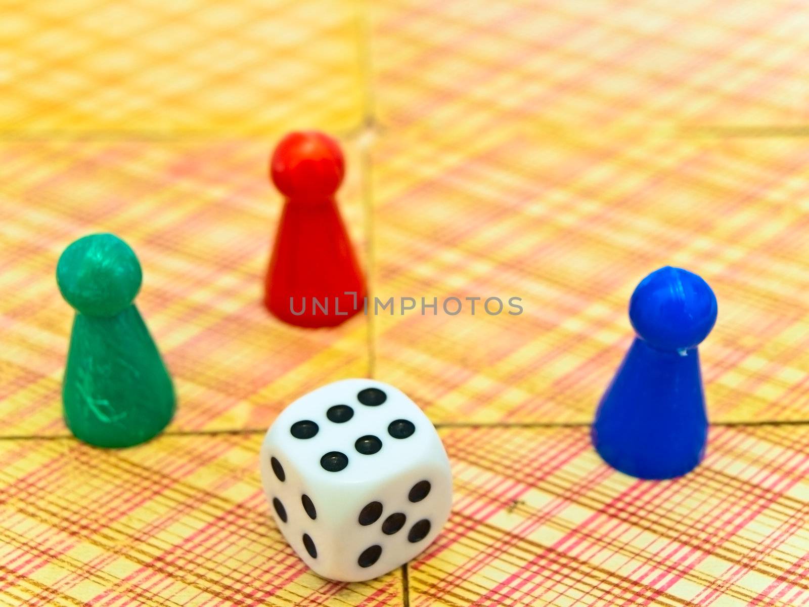 game cube and tools at the playing card background