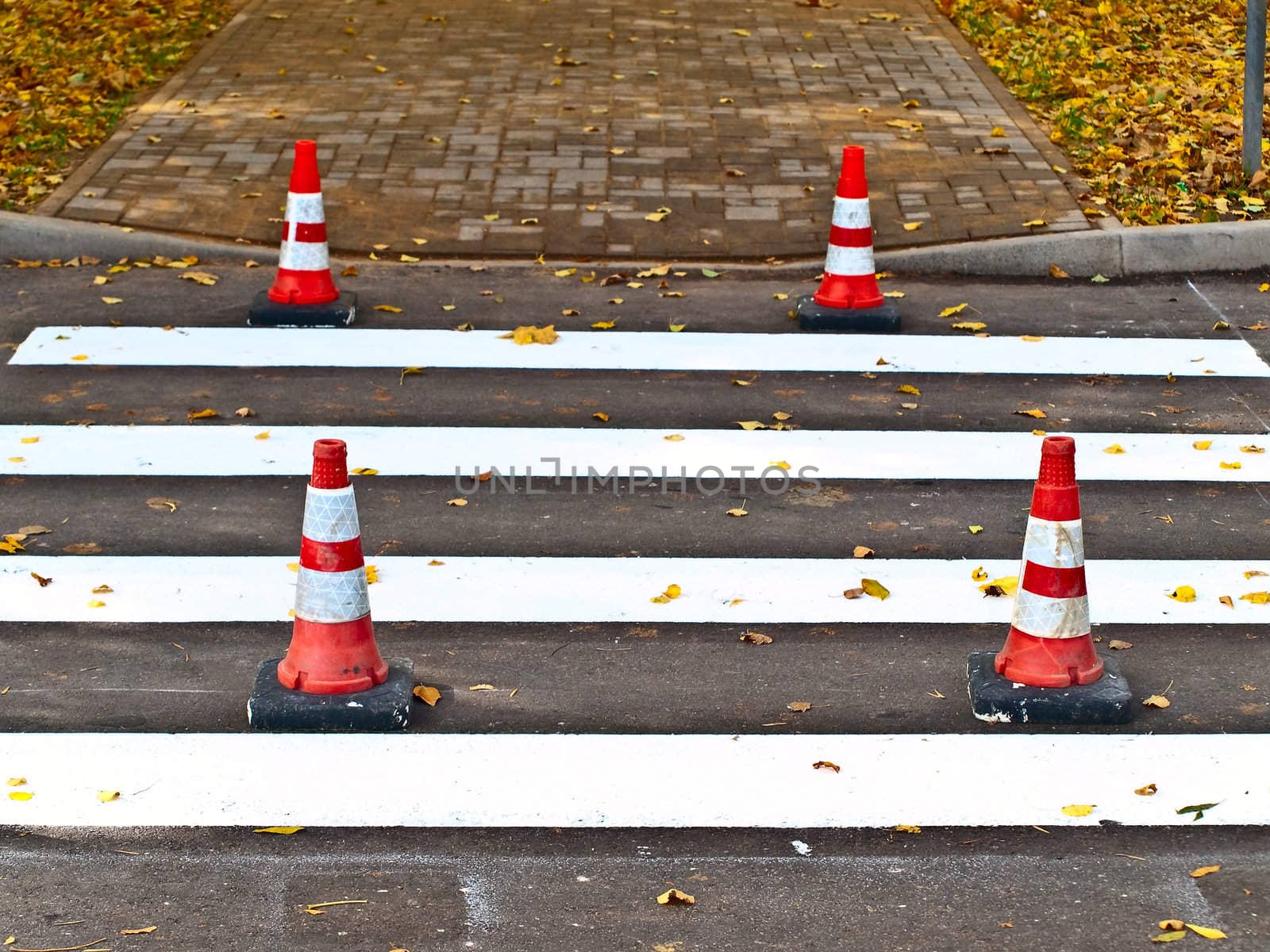 crosswalk repair in autumn time