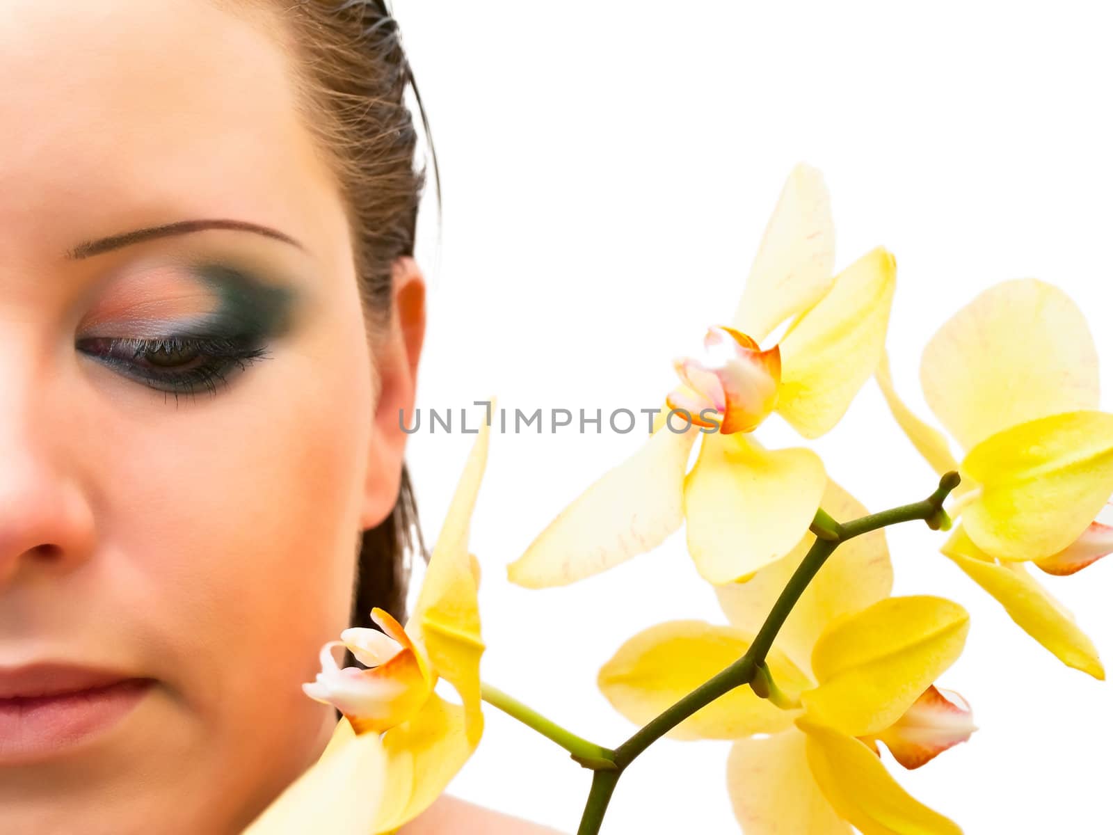 portret of woman with the yellow orchid