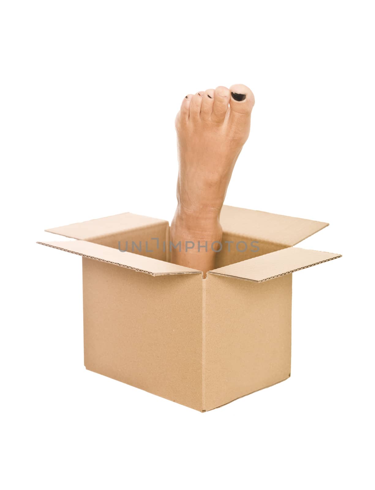 Human foot in a cardboard box isolated on white background