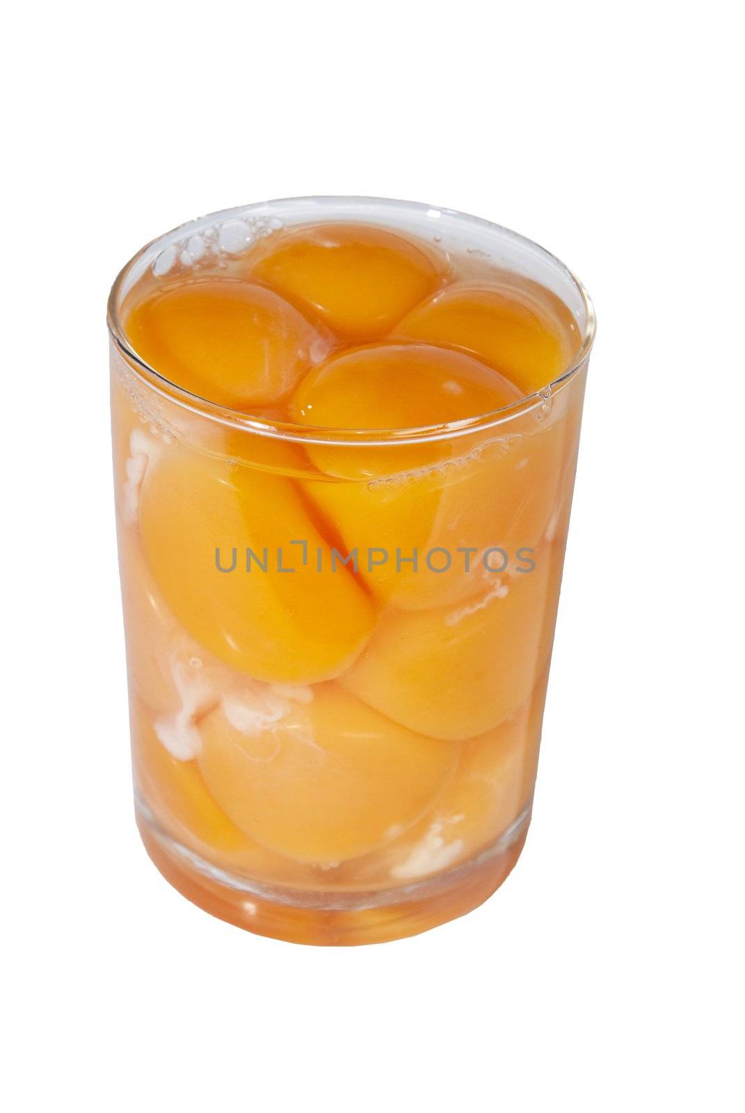 Yolks of eggs are in glass