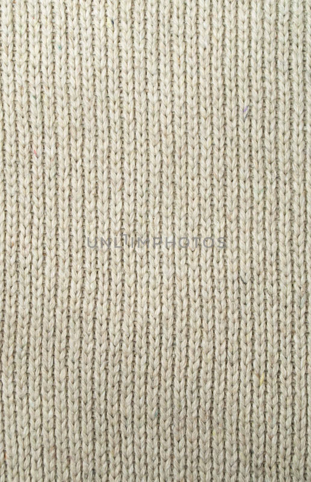 woolen knitted sweater of beige color
