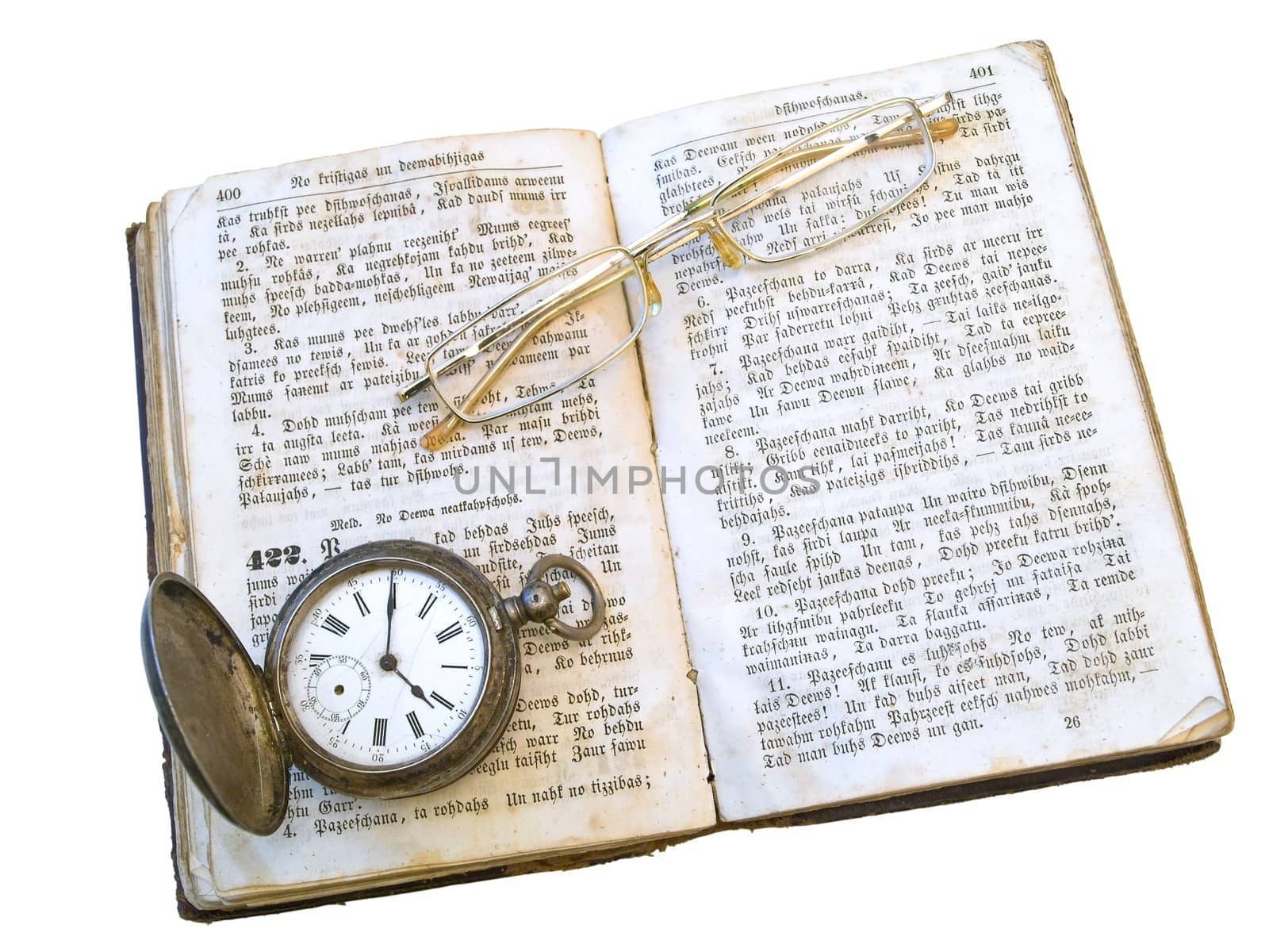 old open book with glasses and clock on it against the white background 