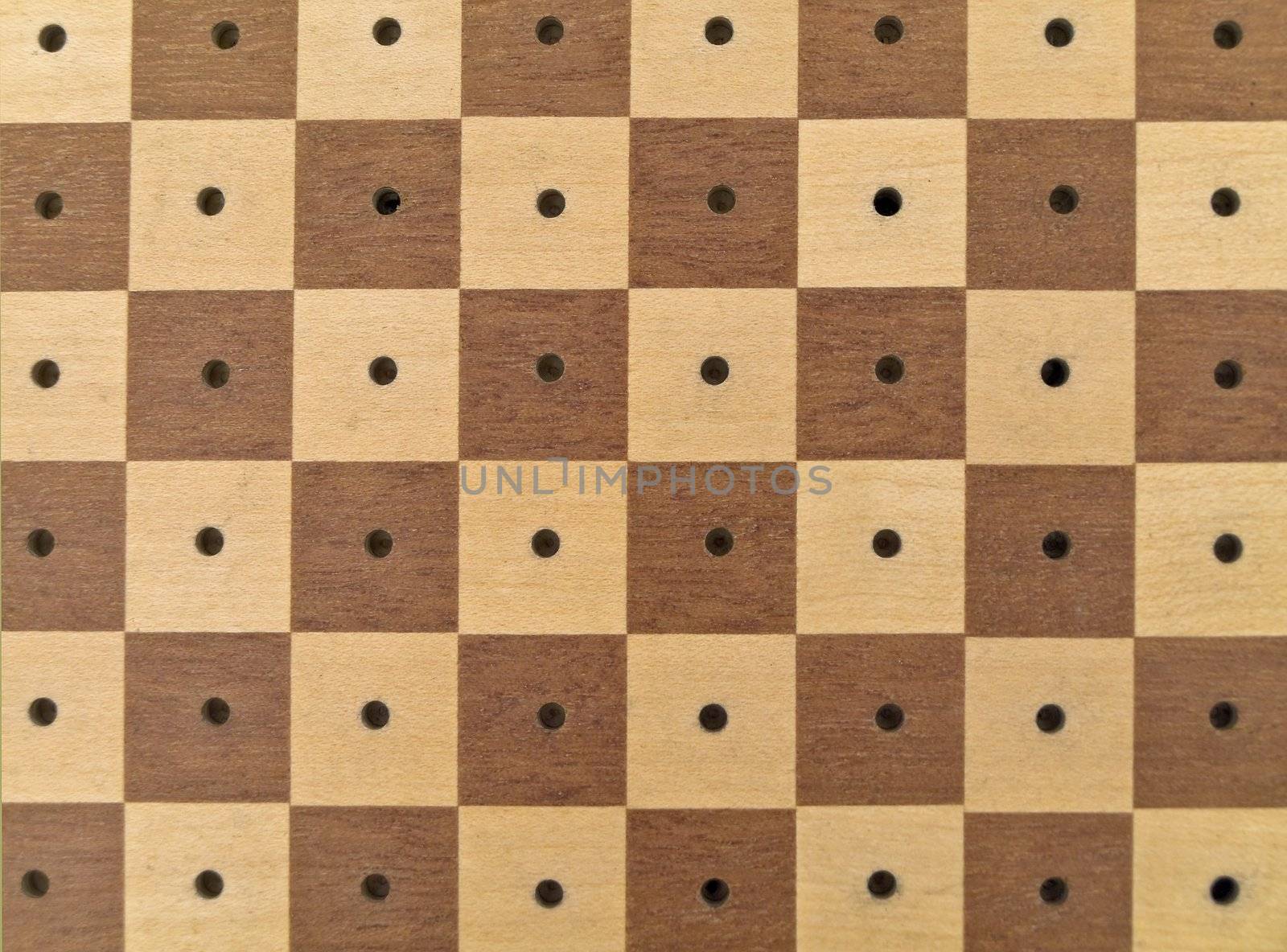 The chessboard in brown and white without 	chessmen