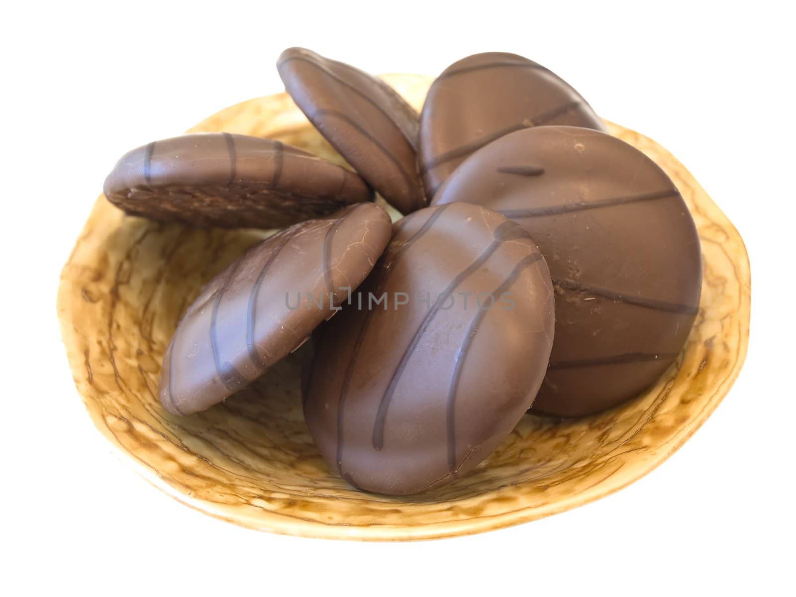 Isolated plate with biscuit against the white background