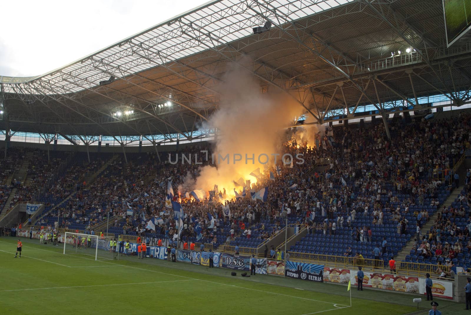 supporters burn flares