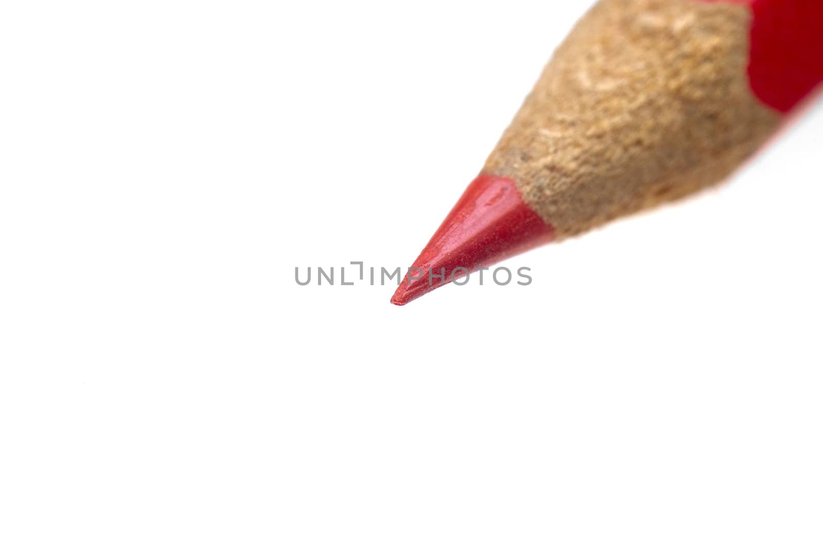 red coulor wooden sharpened  pencil over white background