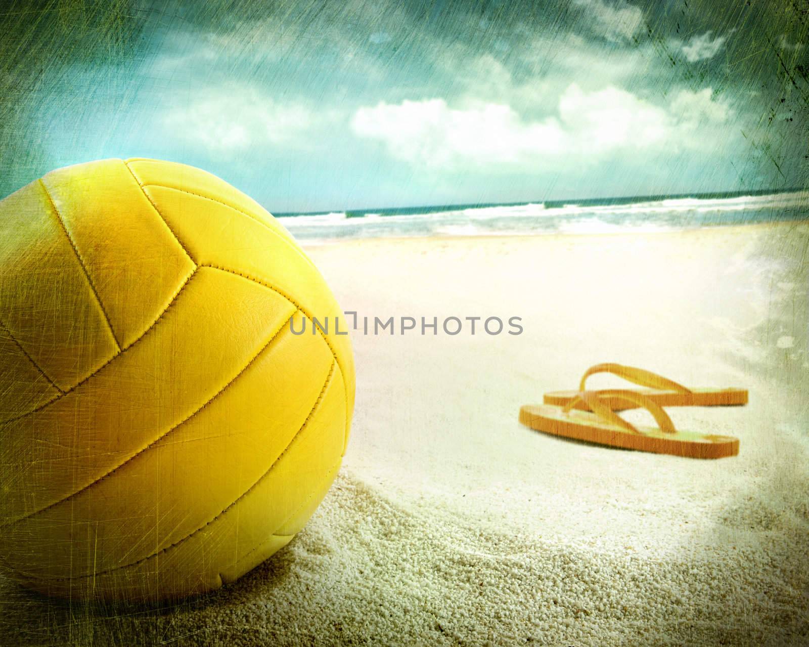 Volleyball in the sand with sandals at the beach