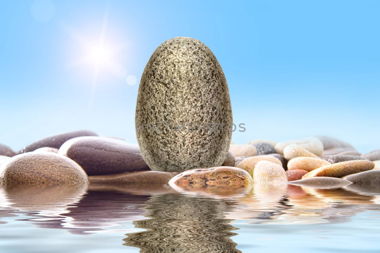 Pile of river rocks on white background