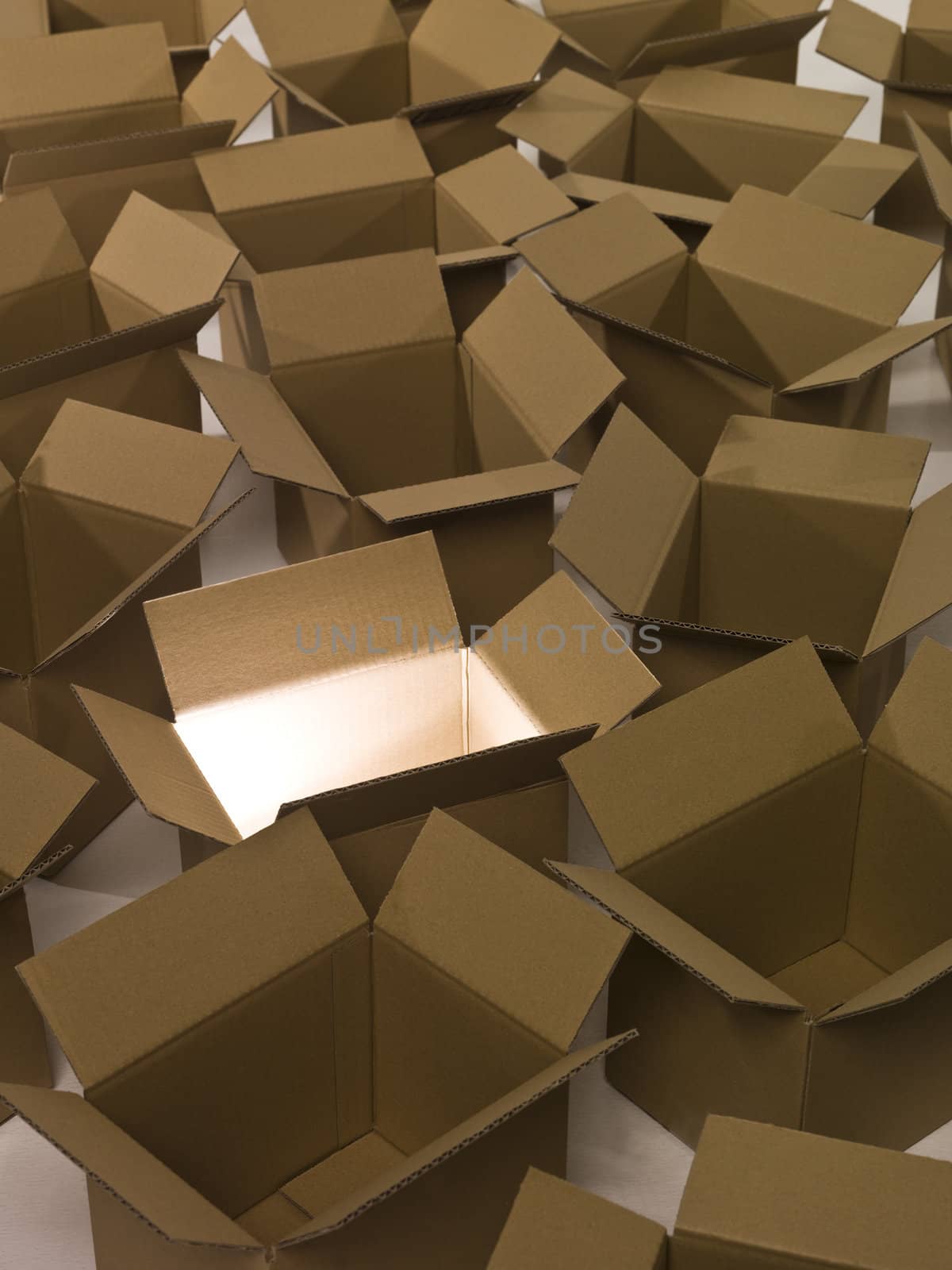Heap of packages with light in one cardboard box