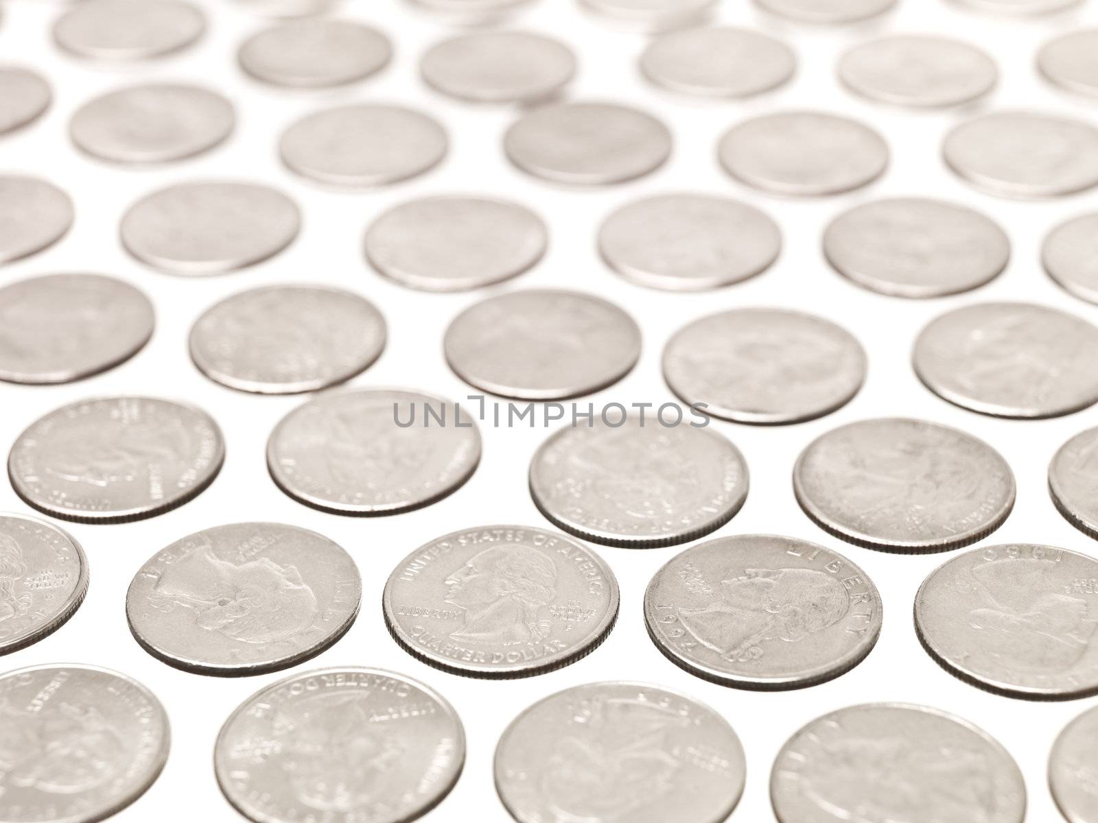 Arranged Quarter coins on white background