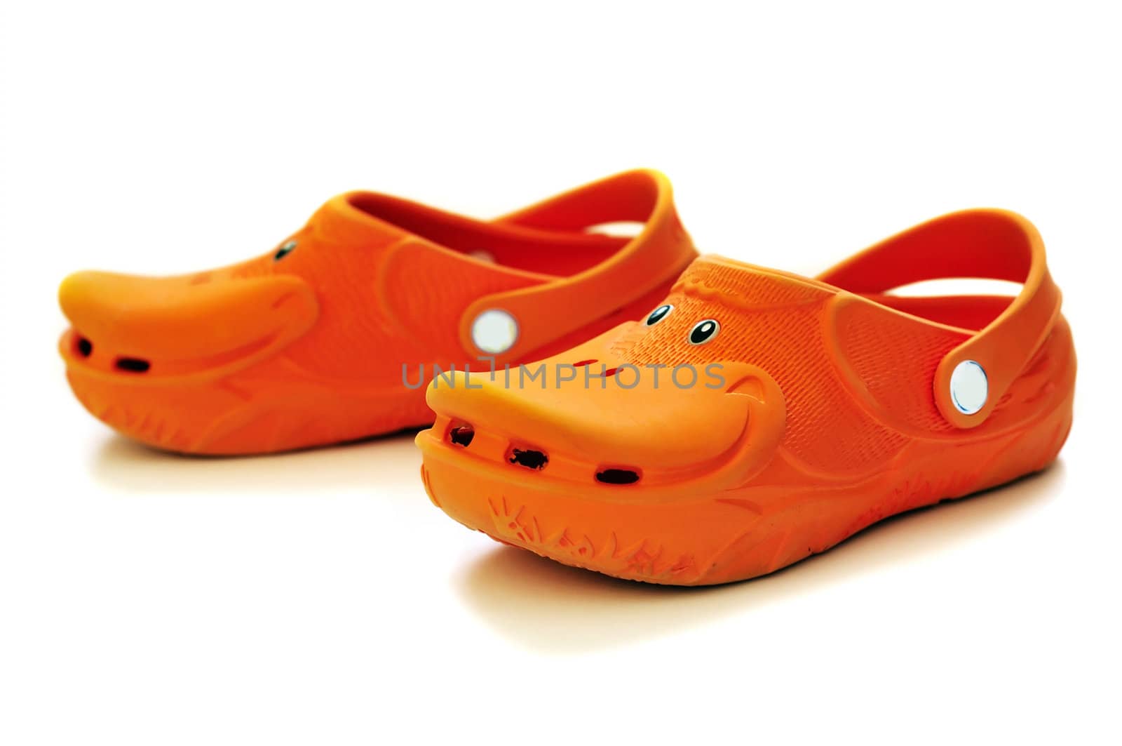 funny orange child's rubber shoes, like a duck