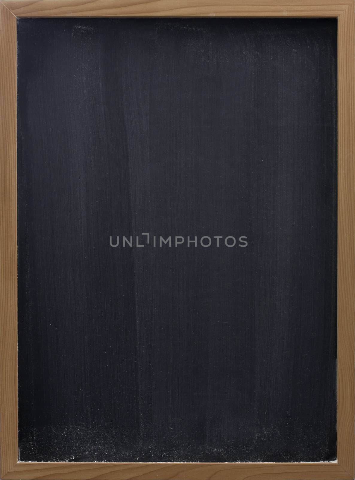 blank blackboard with vertical eraser smudges by PixelsAway