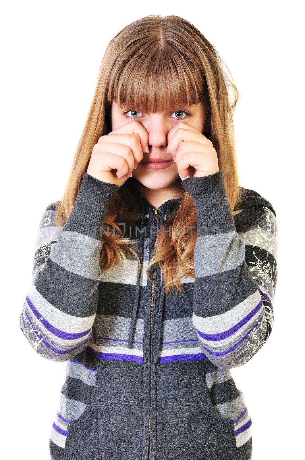 sad teen girl crying over the white