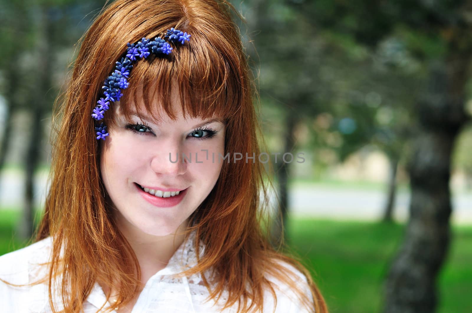 redheaded girl in the spring forest by Reana