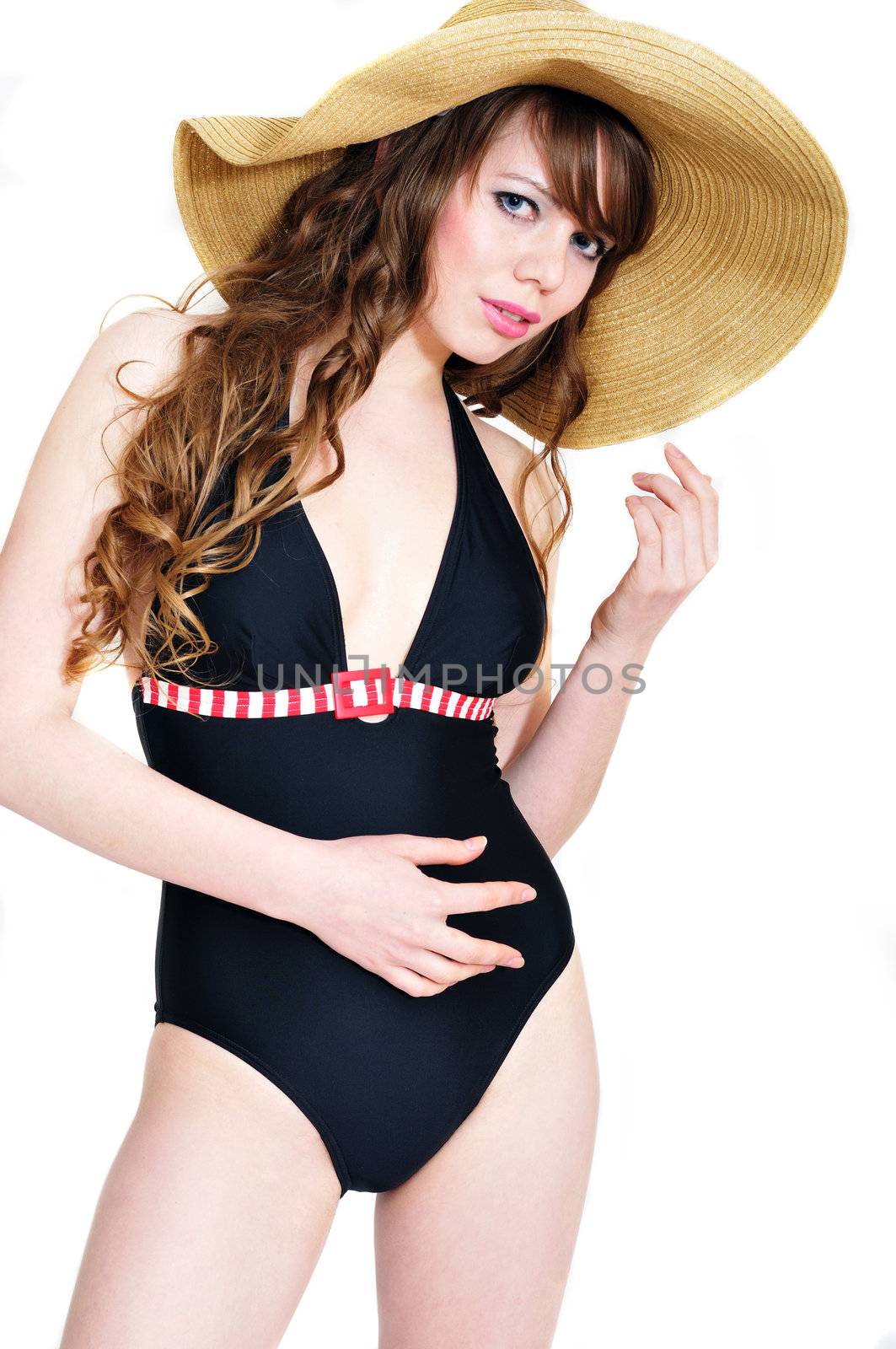 sensual longhaired bikini girl wearing straw hat
