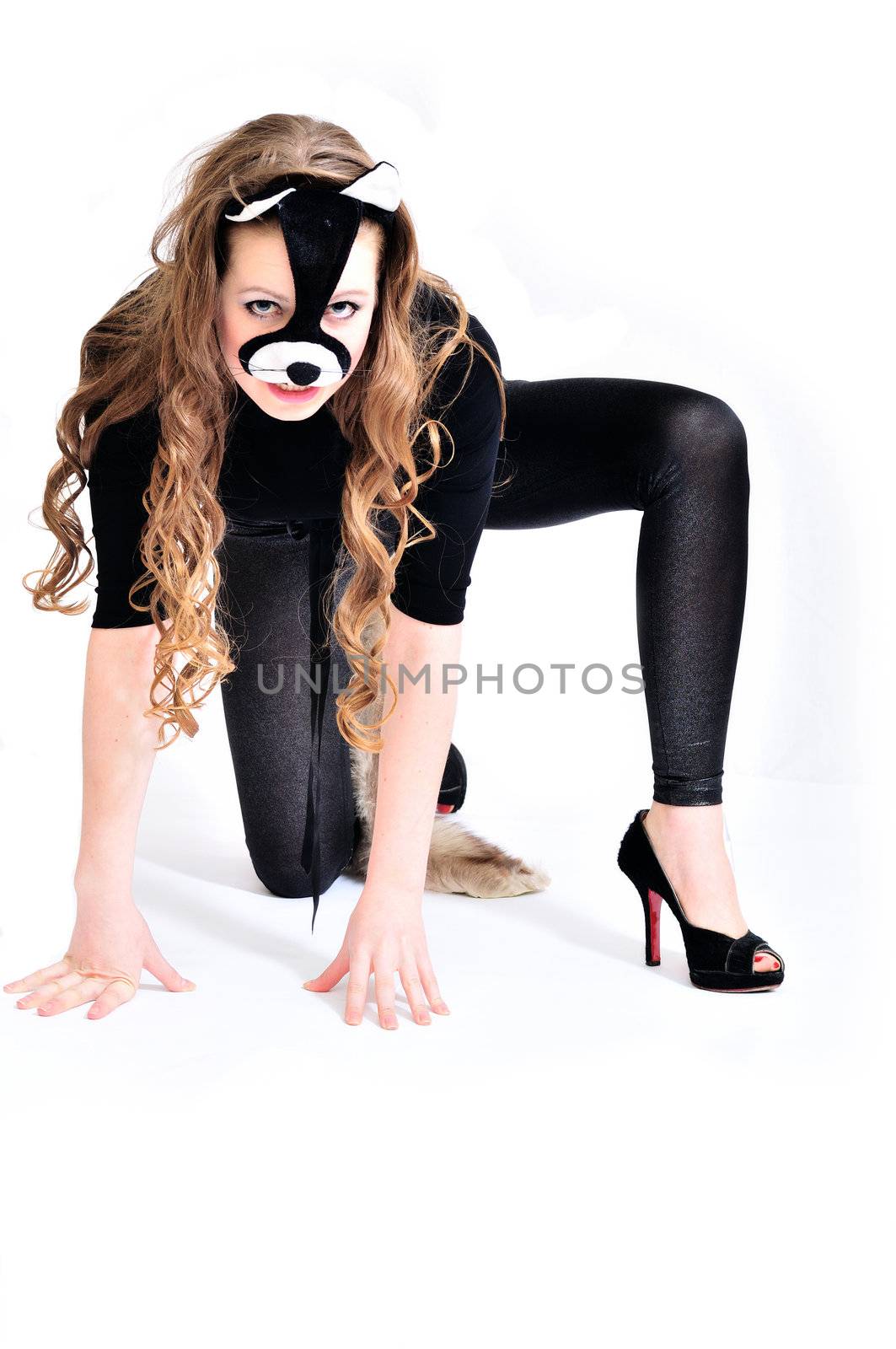 attractive cat-woman with long hair sitting over the white
