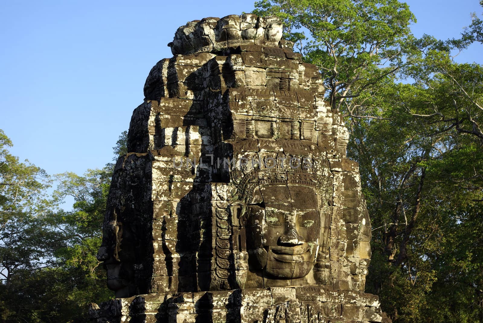 View details of a multifaceted visages tower of Bayon Temple in Angkor.
