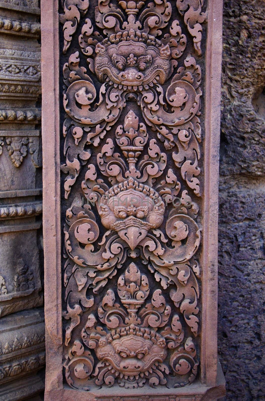It's a close-up on an engraved red stone of the Prasat Kravan temple in Angkor