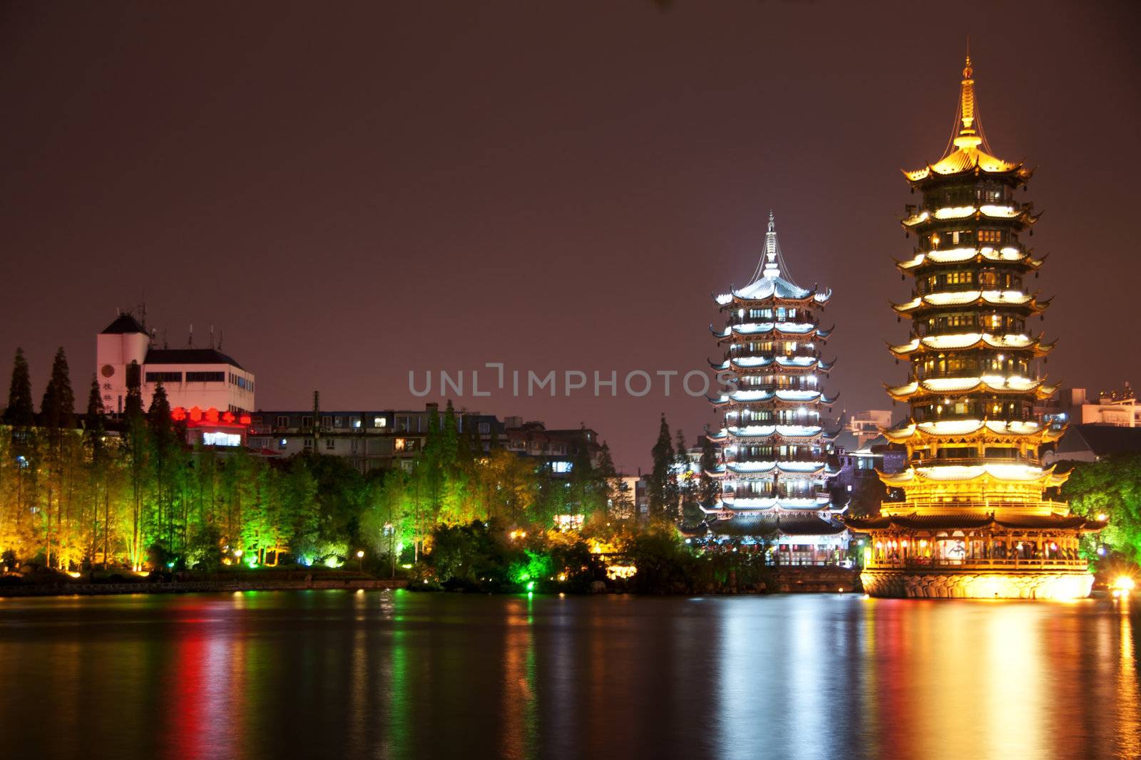 Guilin: double pagode towers. by Claudine