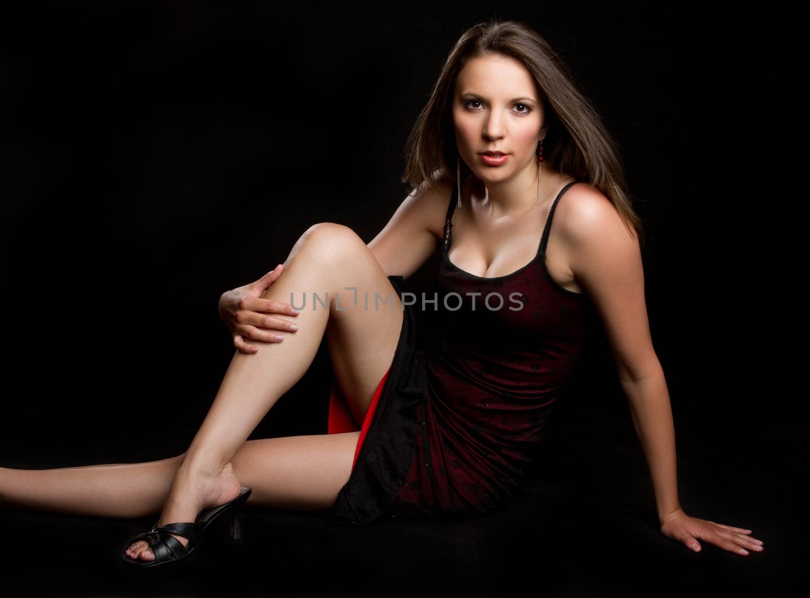 Sexy young woman sitting down