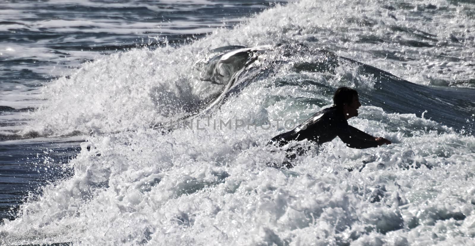 Surfing the waves is a very rare event in Malta