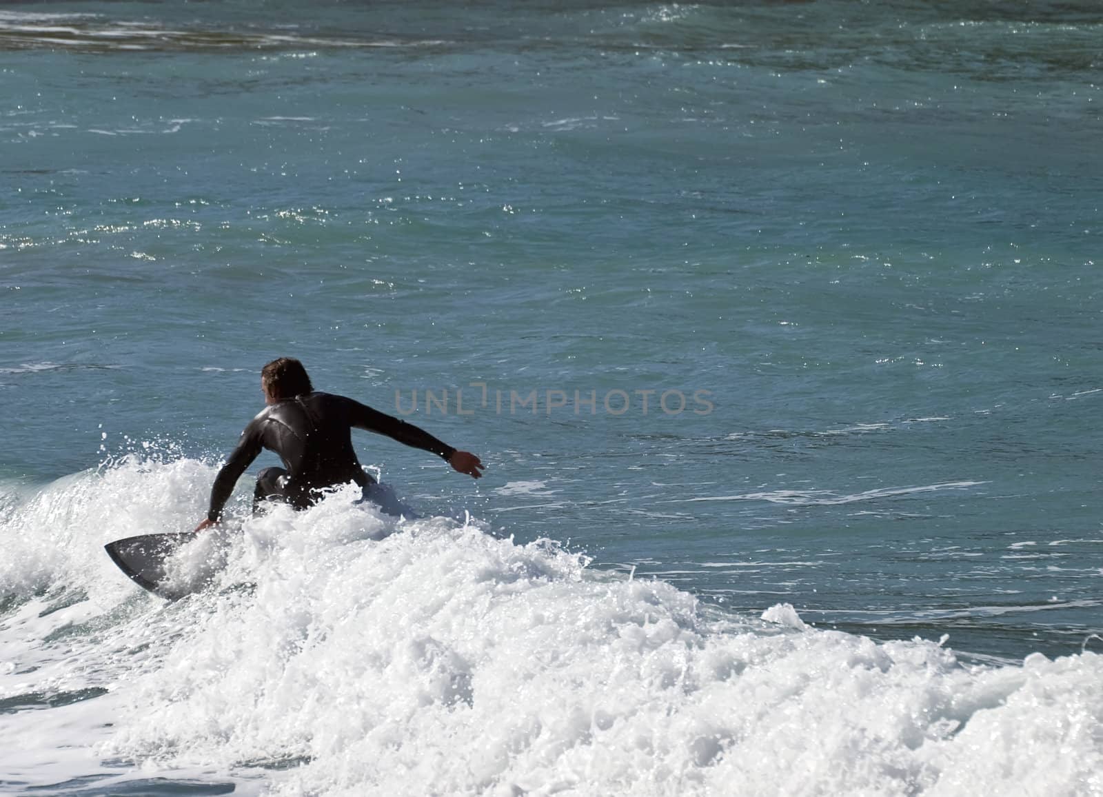 Surfing the waves is a very rare event in Malta