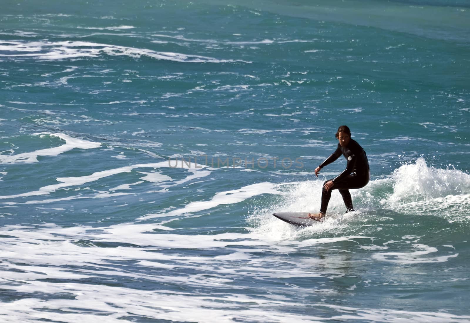 Surfing the waves is a very rare event in Malta